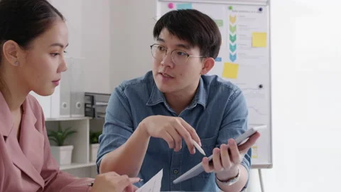 Young team small group meeting discuss brainstorm workshop at office. Video stock 157355995