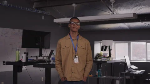 Young Tech Guy Stands In Office Stock Footage 208778432