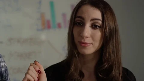 Young tech savvy professionals in working environment team building Stock Footage 78719625