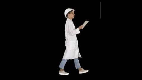 Young technician inspecting and taking necessary notes on digital tablet, Alpha Stock-Footage 116001508