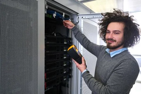 Young technician working Stock Photos
