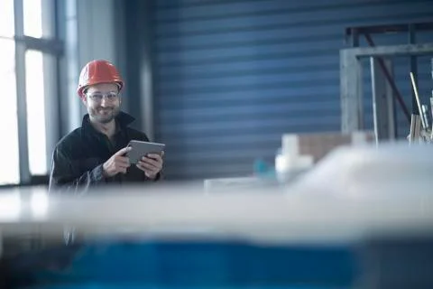 Young technician working with tablet pc Stock Photos
