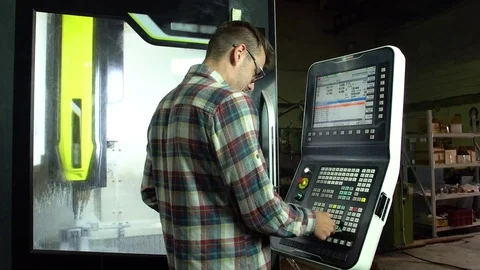 Young technologist check the work of the milling machine 4k. Stock Footage 77828074