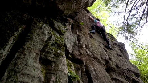 Young teen boy with legs outstretched, r... | Stock Video | Pond5