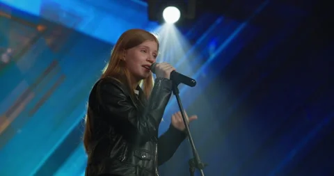 Young teenager girl singer talent is sin... | Stock Video | Pond5