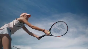 Young tennis player serving Stock Footage 85647696