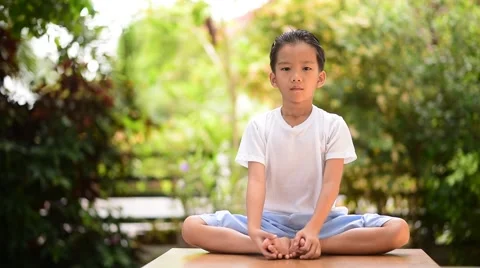 Young Thai boy practicing yoga  Stock Footage 68989830