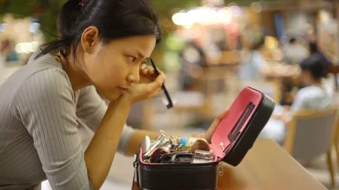 Young Thai Woman doing makeup contouring eyebrows 4k UHD (3840x2160) Stock Footage