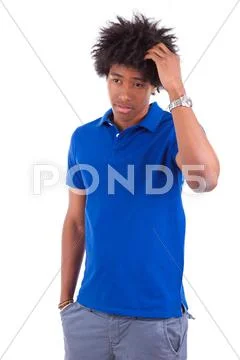 Young thoughtful black teenage men reading a books - african people - african Stock Photos