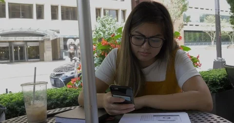 Young Tired College Student Does Homework at a Coffee Shop 스톡 동영상 114704336