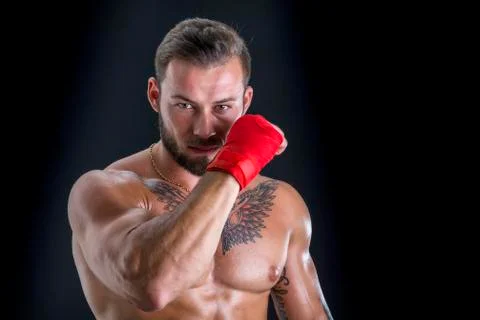 Young topless boxer looking at camera Stock Photos