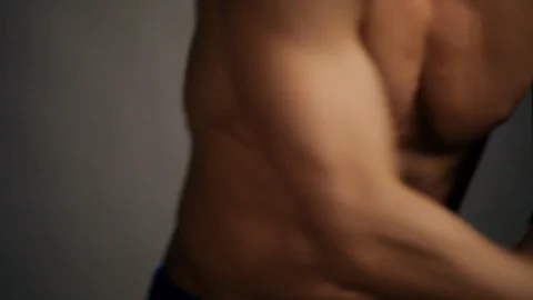 Young topless rolled man posing Stock Footage 98716283