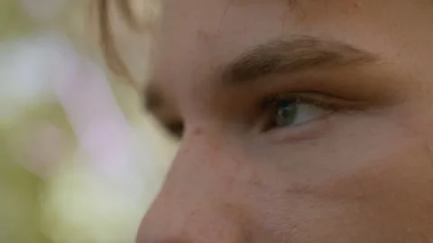 Young Tourist Looking Lost in Forest with Freckled Skin and Green Eyes Close Up Stock Footage 316945943