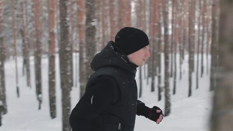 Young Tourist Runs In The Winter Forest Stock Footage 76604953