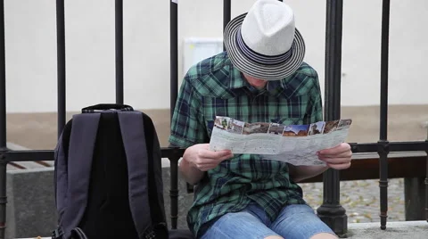 Young tourist using a map, student, teenager, traveling, vacation Stock Footage 40685804