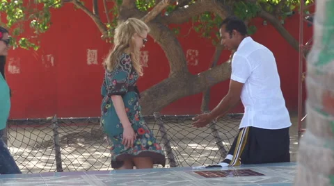Young Tourists Receive Warm Welcome In Traditional Maldivian Village Stock Footage 47851069