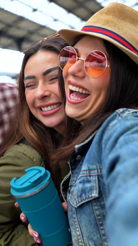 Young tourists taking selfie at train station Stock Footage 311809556