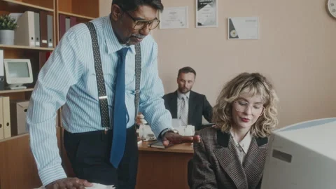Young Trainee Typing on Vintage Computer to Office Workers Dictation Stock Footage 280262762