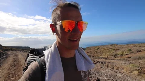 Young Travel Guy Videographer Making Video Blog for social media in Tenerife. 動画素材 151323751