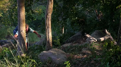 Young Traveler Walking in Forest with Backpack. Hiking and Travel Concept. Видео 66549815