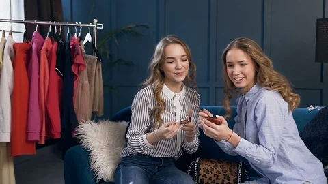 Young two cute women using camera to recording make up tutorial for blog. Stock Footage 105922654