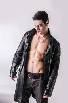 Young Vampire Man in an Open Black Leather Jacket Stock Photos