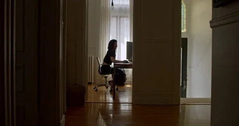 Young video editor works on project in her beautiful home office Stock Footage 131118222