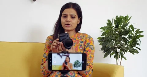 Young vlogger records a video of herself Stock Footage 140769742