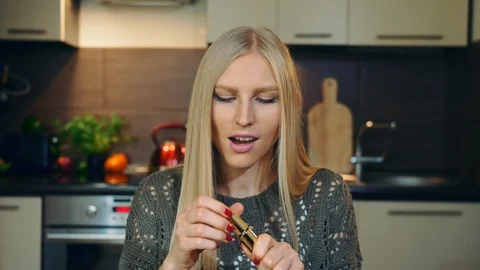 Young vlogger talking about makeup mascara. Attractive young woman talking about Stock Footage 95780868