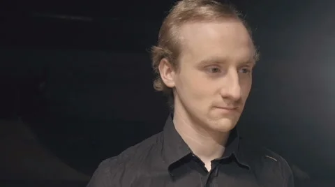 A young waiter coming into frame Stock Footage 61079100