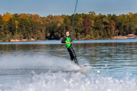 Young Wakeboarder Performing Tricks Stock Photos