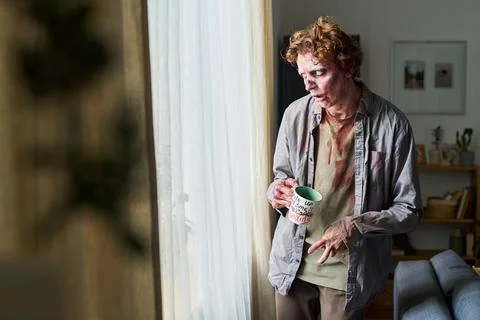 Young Walking Dead Looking Out Of Window Stock Photos