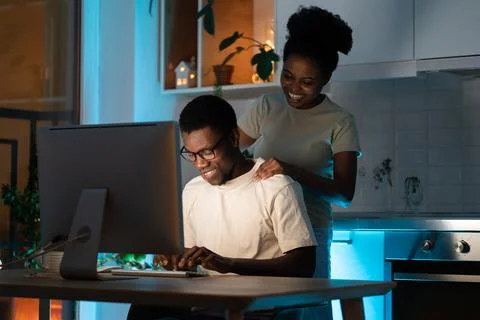 Young web developer working from home, code app or programming with support of 库存照片