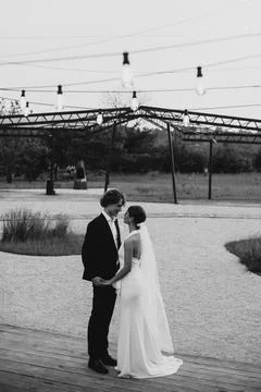 Young wedding couple dancing together on their own Stock Photos