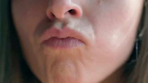 A young white girl with an appetite eats a salad, enjoying every bite. Stock Footage 234021588