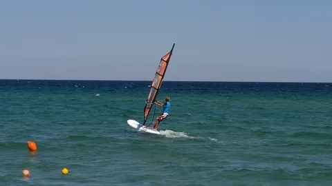 Young Wind Surfer Learning How To Ride Stock Footage 119937933