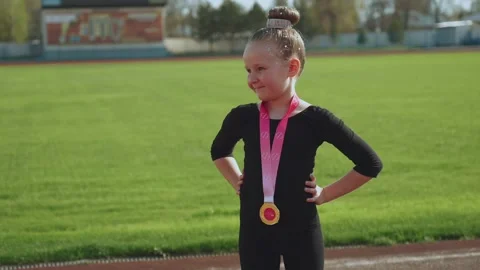 A young winner of rhythmic gymnastics competitions Stock Footage 307290949