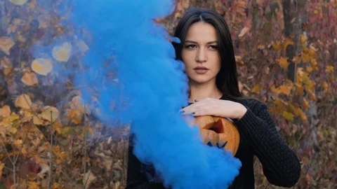 Young witch and her orange friend. Stock Footage 118306796