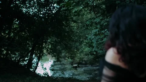 A young witch is turning to the camera 스톡 동영상 130377676