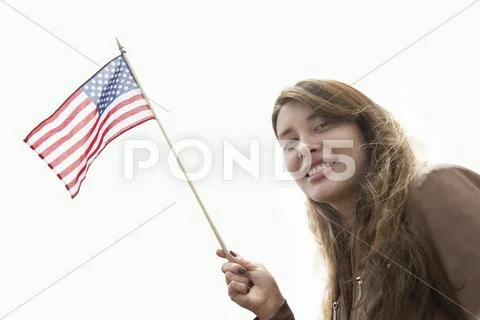 Young Woman With American Flag Stock-Fotos