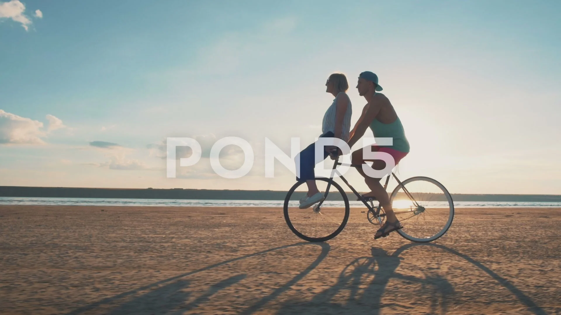 man and woman on bike