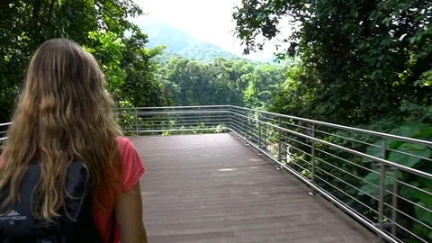 Young Woman With Backpack Walking On Viewpoint Platform In Jungle [Slow Motion] Stock Footage 88899260