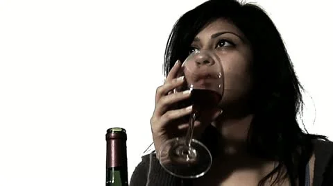 Young woman binge drinking Stock Footage