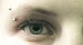 young woman blue eye - macro HD Footage
