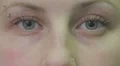 young woman blue eyes - macro HD Footage