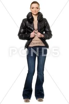 Young woman in a blue jeans Stock Photos