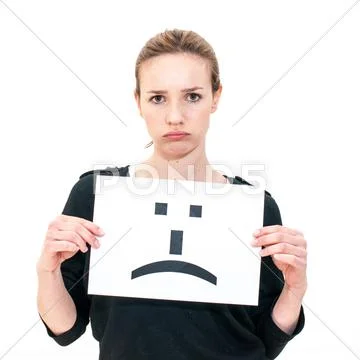 Young woman with board sad emoticon face sign Stock Photos