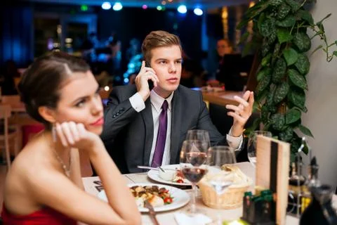 Young woman on boring dating Stock Photos