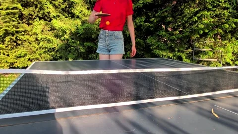 Young Woman Bouncing Ping Pong Ball On Racket At Outdoor Table Tennis Stock Footage 342069712