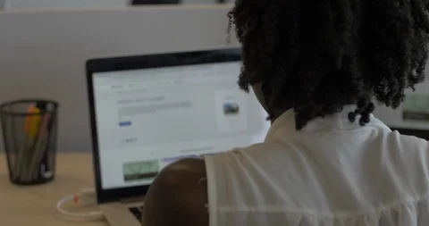 Young Woman Browsing Web at Work Distracted by Internet and Not Productive Stock Footage 112816145